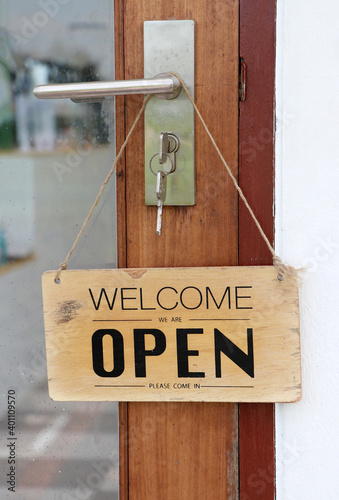 Open sign hung on the door. welcome customers to enter