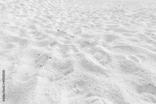 black and white picture of sandy background.