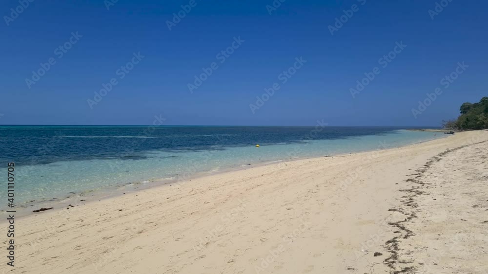 Aerial Over Sandy Beach On Green Island. Low Flying Follow Shot Aerial Over Sandy Beach On Green Island. Low Flying Follow Shot