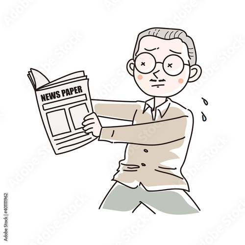 老眼で新聞が読みにくい男性