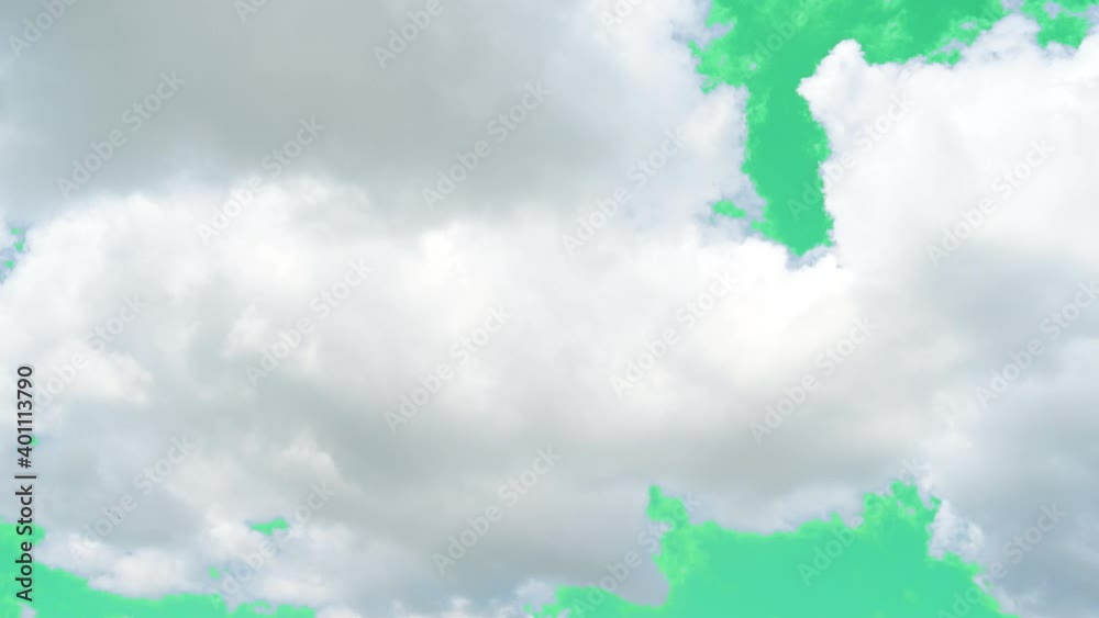 A green screen of moving white clouds with 4K resolution. Can use to ...