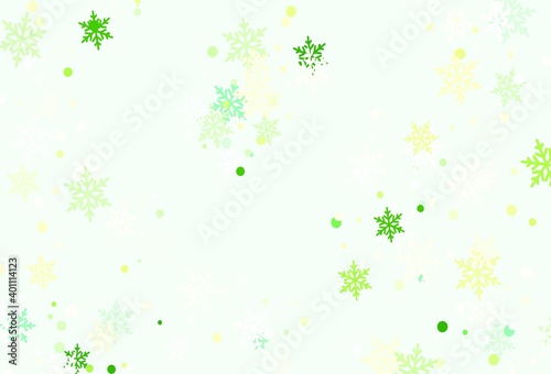 Light Green  Yellow vector texture with colored snowflakes.