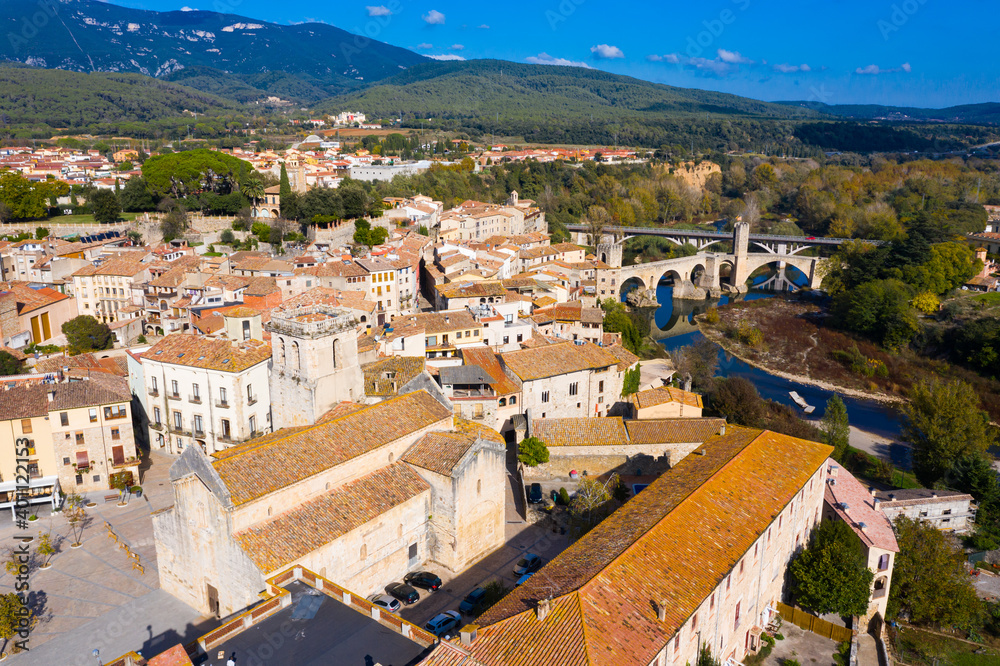 Aerial view of old town of Besalu with old bridge over Fluvia river, Catalonia, Spain