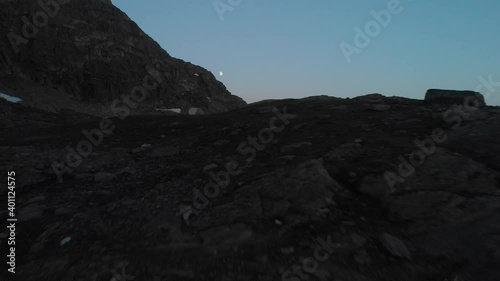 a moonlit landscape in troltunga Norway photo