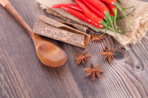 Fototapeta Naklejka Na Ścianę i Meble -  Red pepper and spoon and aniseed