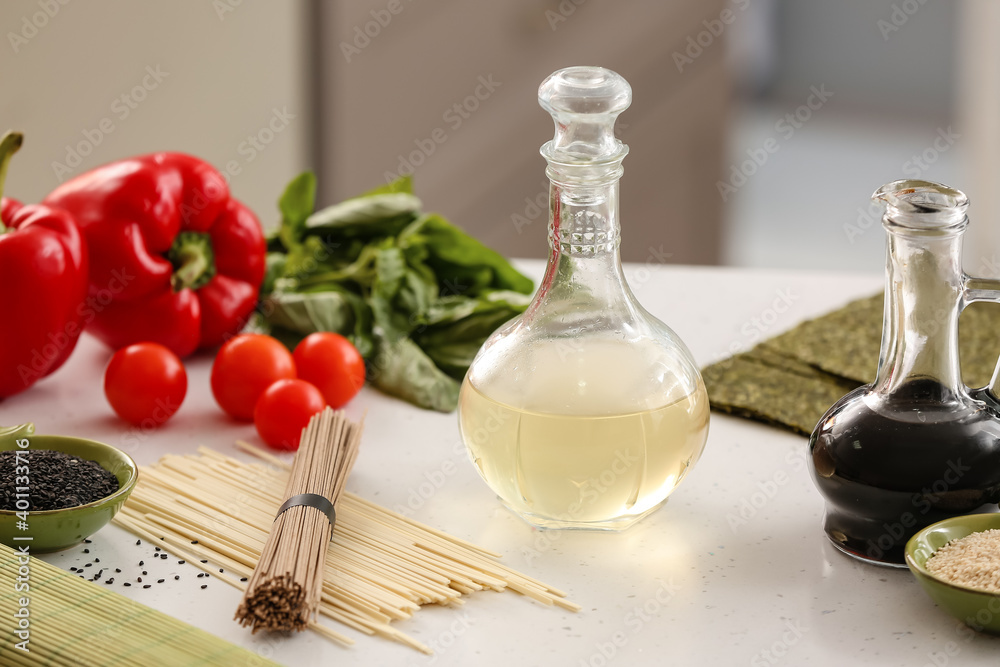 Composition with rice vinegar on table Composition with rice vinegar on table