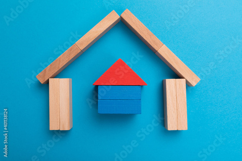 Investment insurance. Life and house protection. Insurance policy concept. Wooden cubes with sign on ground.