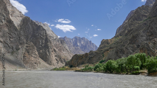 Beautiful panoramic landscape view along the Pamir Highway of the Panj river valley between Afghanistan and Tajikistan in Vanch district, Gorno-Badakshan, Tajikistan