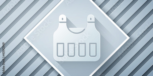 Paper cut Bulletproof vest for protection from bullets icon isolated on grey background. Body armor sign. Military clothing. Paper art style. Vector.