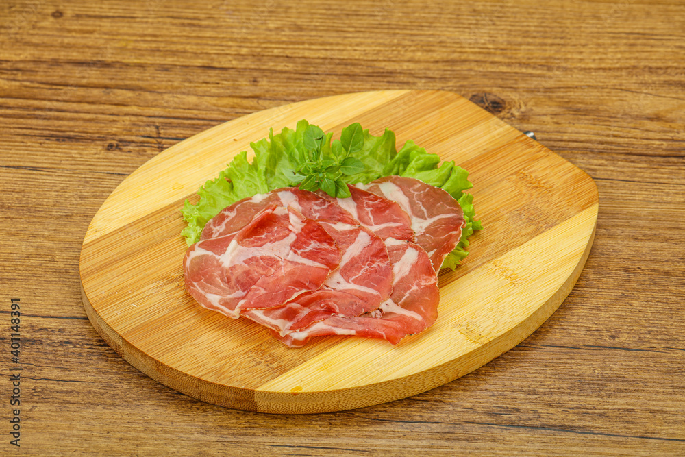 Fototapeta premium Smoked pork neck slices snack