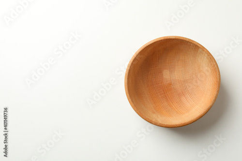 Billede på lærred Empty wooden bowl on white background, space for text