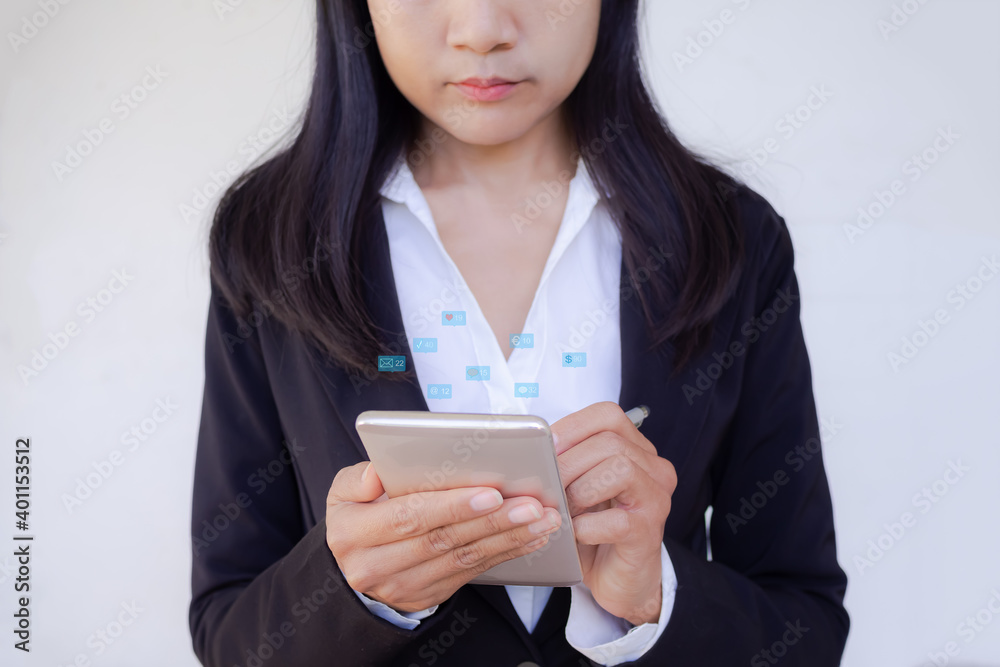 Close up staff business woman with black suit using mobile with icon Envelope, heart shaped, dollar symbol, euro symbol on white background. She is working Close up staff business woman with black suit using mobile with icon Envelope, heart shaped, dollar symbol, euro symbol on white background. She is working