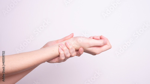 Parkinson's disease symptoms. Close up of tremor (shaking) hands of Middle-aged women patient with Parkinson's disease. Mental health and neurological disorders.