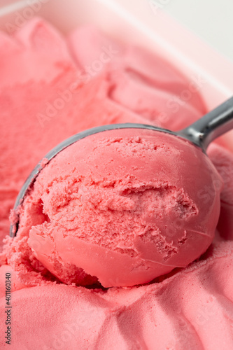 Strawberry ice-cream and strawberry in studio