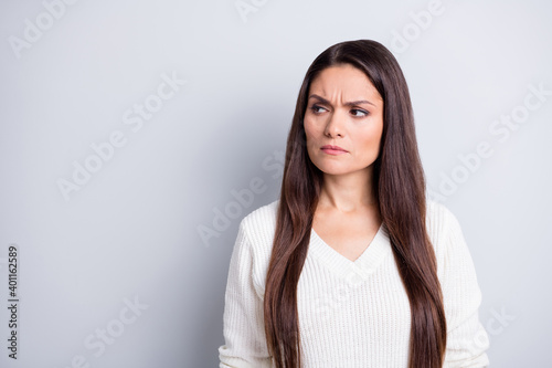 Photo of mature serious unhappy upset negative stressed woman look copyspace isolated on grey color background