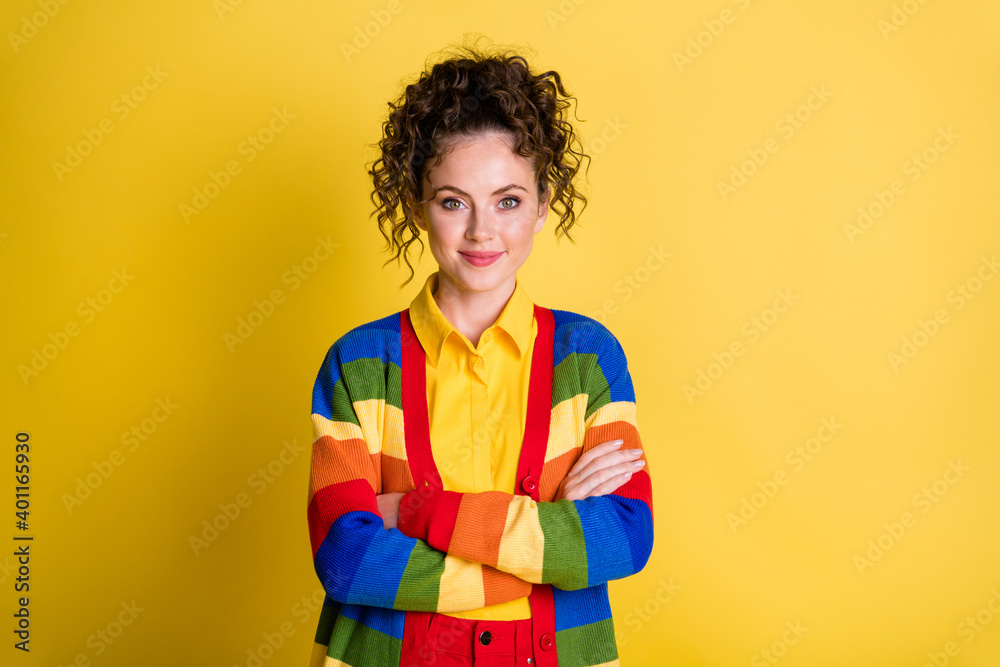 Photo of cheerful girl youth cross hands wear rainbow trend clothes isolated over shine color background Photo of cheerful girl youth cross hands wear rainbow trend clothes isolated over shine color background