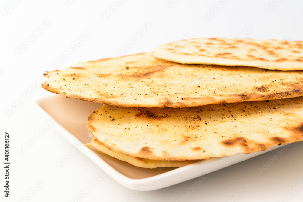 Fototapeta premium Indian bread on white background