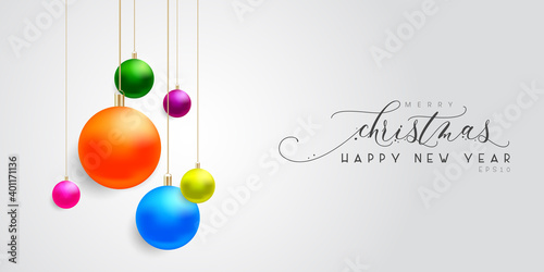 Christmas and New year greeting illustration in white background. Colorful Christmas balls hanging in white background with typography. Vector Illustration.