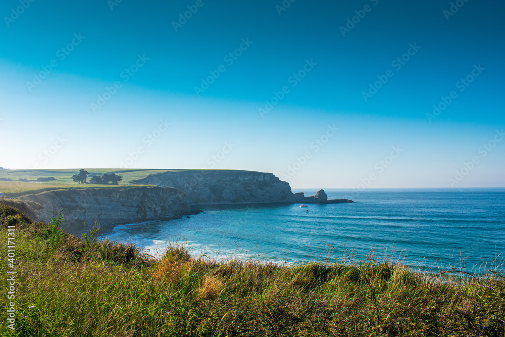 coastline in the ocean with cliffs