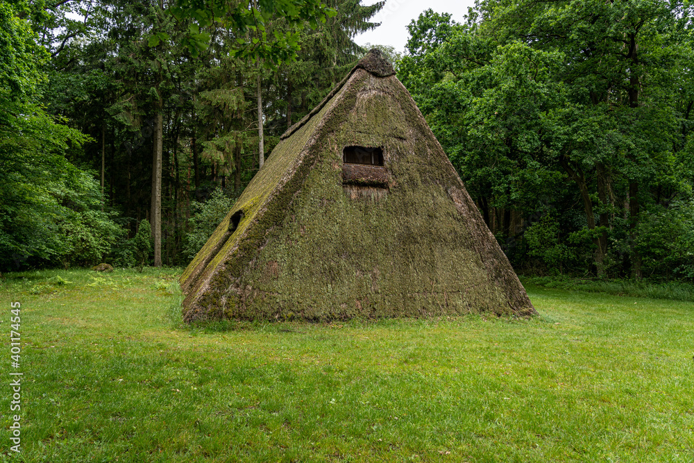 Characteristic stable for German moorland sheep with a straw roof in the natural preserve Lueneburger Heide Characteristic stable for German moorland sheep with a straw roof in the natural preserve Lueneburger Heide