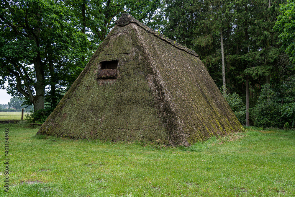 Characteristic stable for German moorland sheep with a straw roof in the natural preserve Lueneburger Heide Characteristic stable for German moorland sheep with a straw roof in the natural preserve Lueneburger Heide