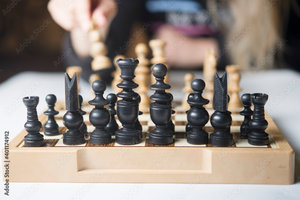 Businesswoman thinking how to play chess concept business strategy for win Businesswoman thinking how to play chess concept business strategy for win