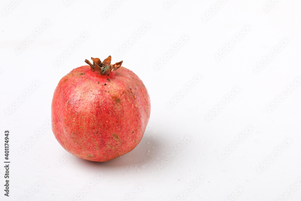Fresh pomegranate fruit on white background Fresh pomegranate fruit on white background