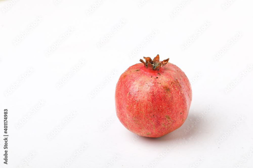 Fresh pomegranate fruit on white background Fresh pomegranate fruit on white background