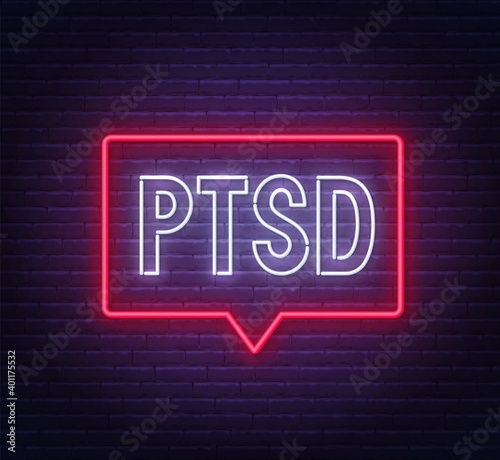PTSD neon sign on brick wall background .