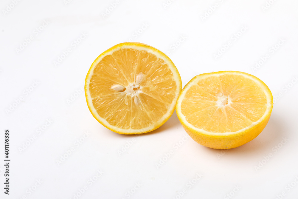 Fresh Half cut sweet lemon or mosambi fruit on white background