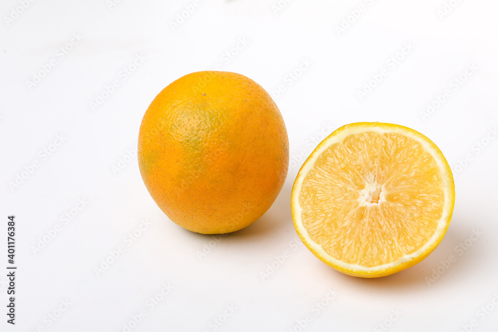 Fresh Half cut sweet lemon or mosambi fruit on white background Fresh Half cut sweet lemon or mosambi fruit on white background
