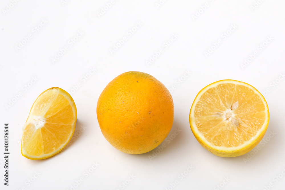 Fresh Half cut sweet lemon or mosambi fruit on white background