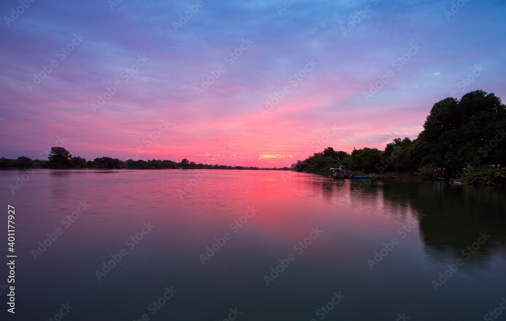 Sunrise over the River Gambia, looking upstream at Georgetown, Gambia.
