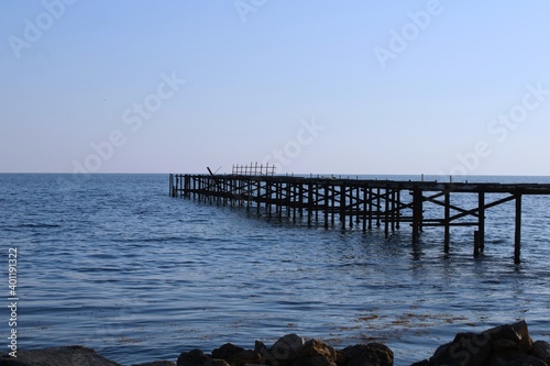 Abandoned pier in the sea  quay  lonely jetty  old wharf  sea landscape  lonely pier  beautiful sea  seawater  old dock 