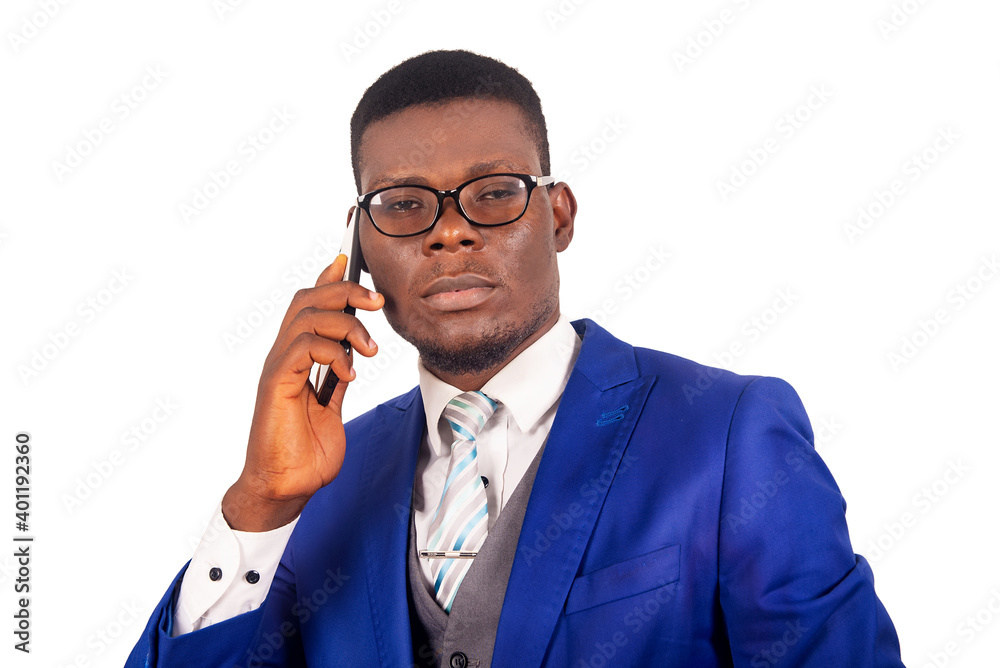 close-up of a handsome young businessman with mobile phone, thou close-up of a handsome young businessman with mobile phone, thou