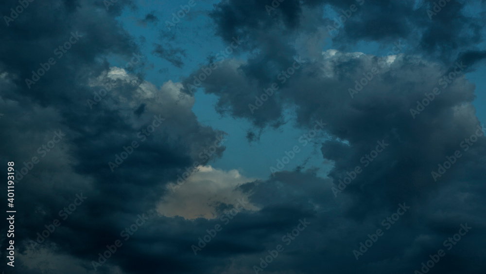 Dramatic sky with clouds at sunset