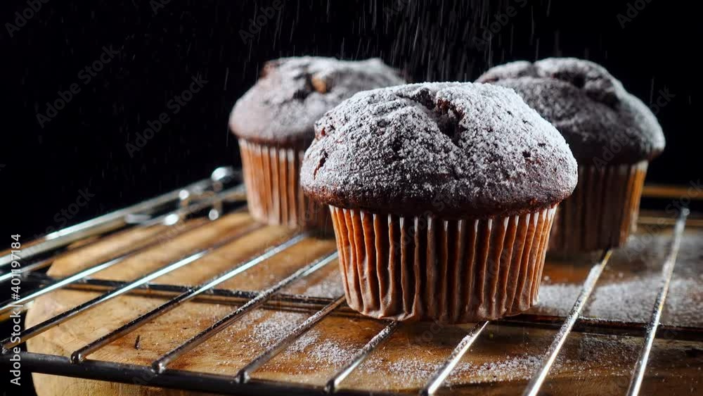 Sprinkle three muffins with icing sugar