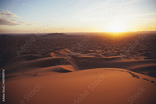 Hiking and camel rifing in the highest dunes of Erg Chebbi, Sahara desert, Morocco © m