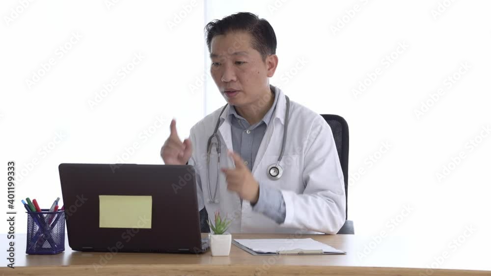 doctor talking to patient making video call on laptop. doctor male speaking looking at pc screen communicating by webcam in web chat consulting client online. Telemedicine concept doctor talking to patient making video call on laptop. doctor male speaking looking at pc screen communicating by webcam in web chat consulting client online. Telemedicine concept
