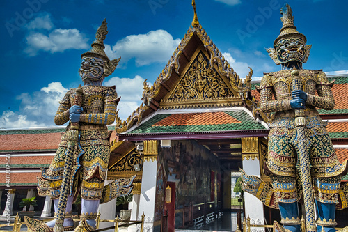 temple city entrance with two giants at the grand palace in Bangkok Thailand