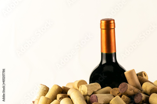 bottle of red wine between corks
