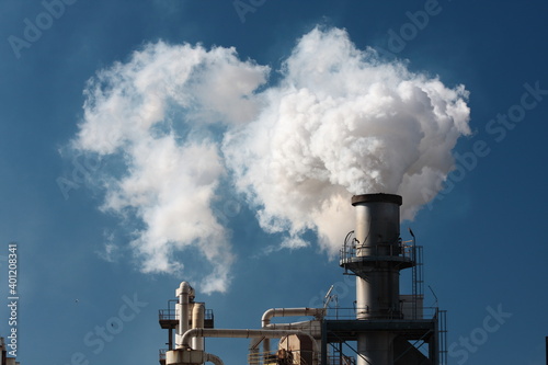 Factory smoke pipe sending smoke to the atmosphere.