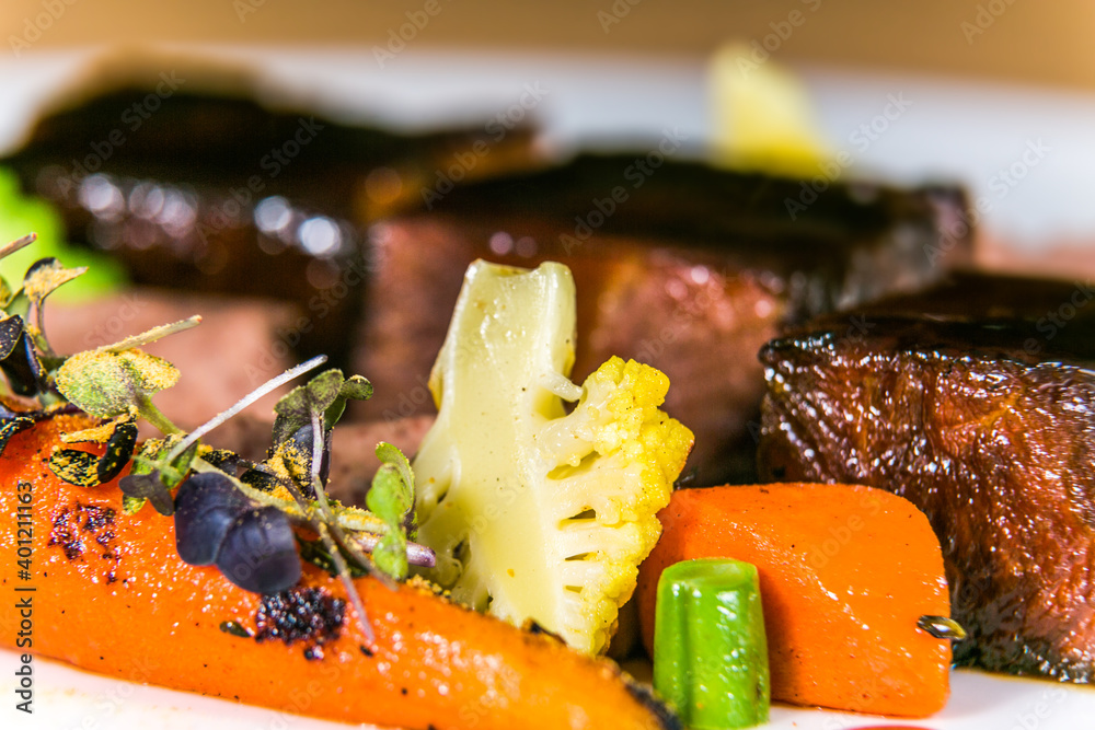 Ostrich steak with fresh vegetables.The food in the restaurant. Food styling and restaurant meal