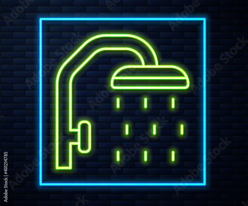 Glowing neon line Shower head with water drops flowing icon isolated on brick wall background. Vector.