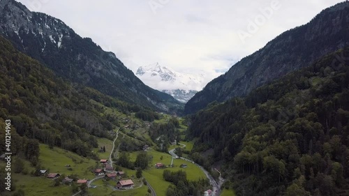 Flying over valley of Grindelwald in Switzerland