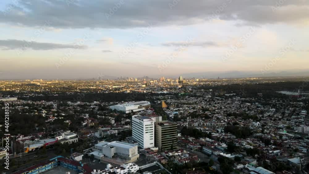 Aerial shot of Mexico City's skyline; flying over Ciudad Satelite Aerial shot of Mexico City's skyline; flying over Ciudad Satelite