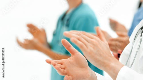 background image.groups of doctors applauding at the meeting