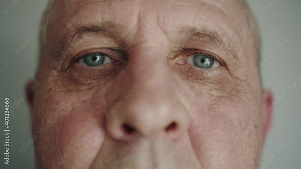Closeup portrait of mature man. Eyes of elderly man closeup. Man looks at the camera. Shot in 6K Closeup portrait of mature man. Eyes of elderly man closeup. Man looks at the camera. Shot in 6K