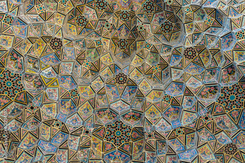Colorful and rosy mosaic  patterns on the ceiling of Nasir Al-Mulk Mosque (Pink Mosque) in Shiraz, Iran