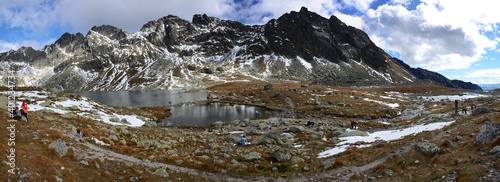 Glacial lake in the background with a ridge of mountains. Hincovo pleso, High Tatras, Slovakia. photo